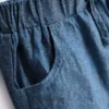 0–12 månader | Set med randig stickad polotröja och shorts