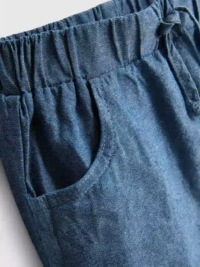 0–12 månader | Set med randig stickad polotröja och shorts