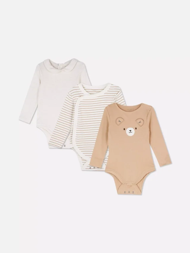 0–18 månader | 3-pack långärmade bodys för nyfödda med utrymme att växa i