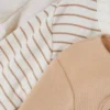 0–18 månader | 3-pack långärmade bodys för nyfödda med utrymme att växa i
