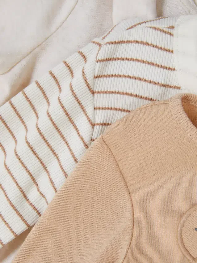0–18 månader | 3-pack långärmade bodys för nyfödda med utrymme att växa i