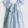 1,5–12 år | The Edit – blommig broderad smockklänning