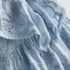 1,5–12 år | The Edit – blommig broderad smockklänning