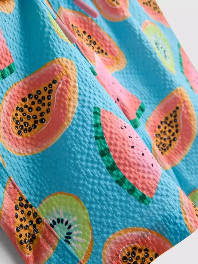 1,5–7 år | badshorts med fruktmönster