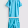 1,5–7 år | set med sport-T-shirt och shorts