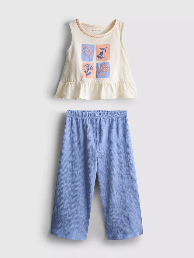 1,5–8 år | Set med broderad peplum-top och byxor