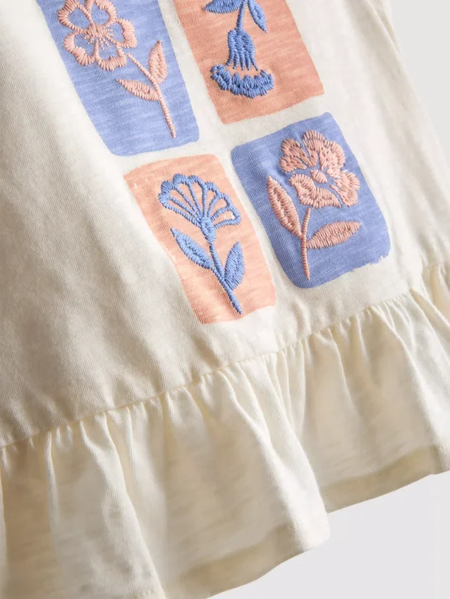 1,5–8 år | Set med broderad peplum-top och byxor