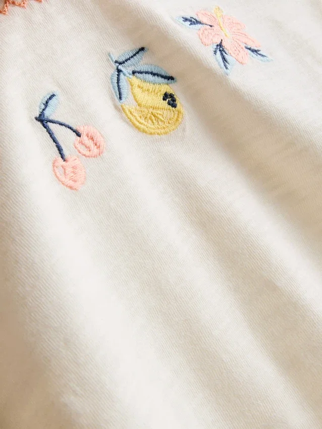 1,5–8 år | Set med broderad peplum-top och byxor