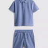 1,5–8 år | Set med polotröja och shorts