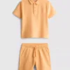 1,5–8 år | Set med polotröja och shorts
