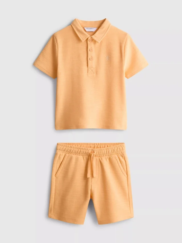 1,5–8 år | Set med polotröja och shorts