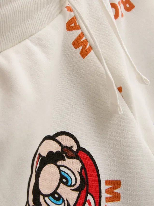 1,5–8 år | Super Mario World-set med tröja och mjukisbyxor