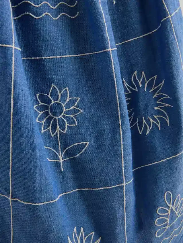 1,5–9 år | broderad cami-klänning i chambray