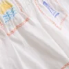 1,5–9 år | broderat set med ärmlös skjorta och shorts
