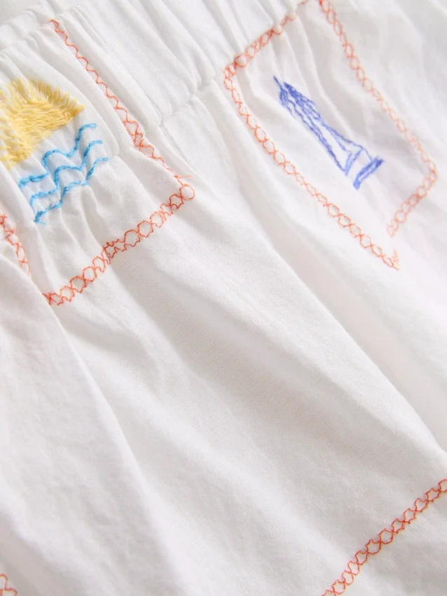 1,5–9 år | broderat set med ärmlös skjorta och shorts