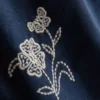 1,5–9 år | byxor med blommig brodyr