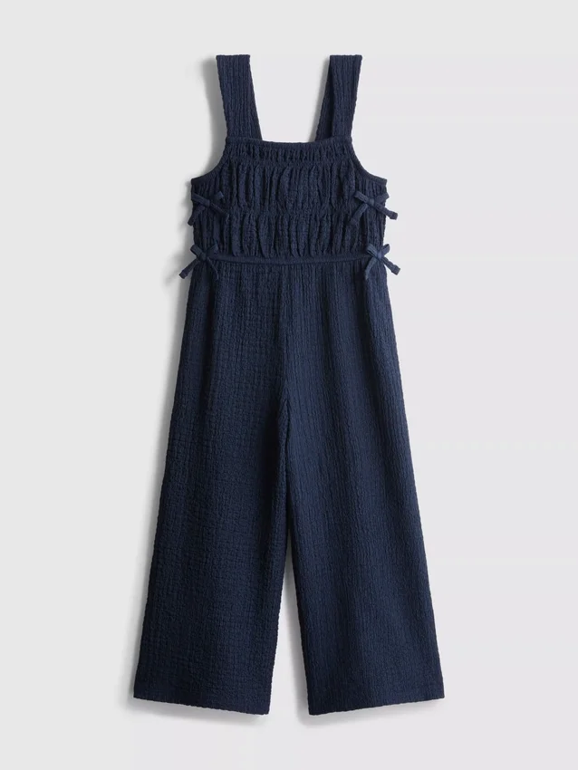 1,5–9 år | jumpsuit med rosett