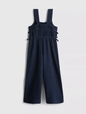 1,5–9 år | jumpsuit med rosett
