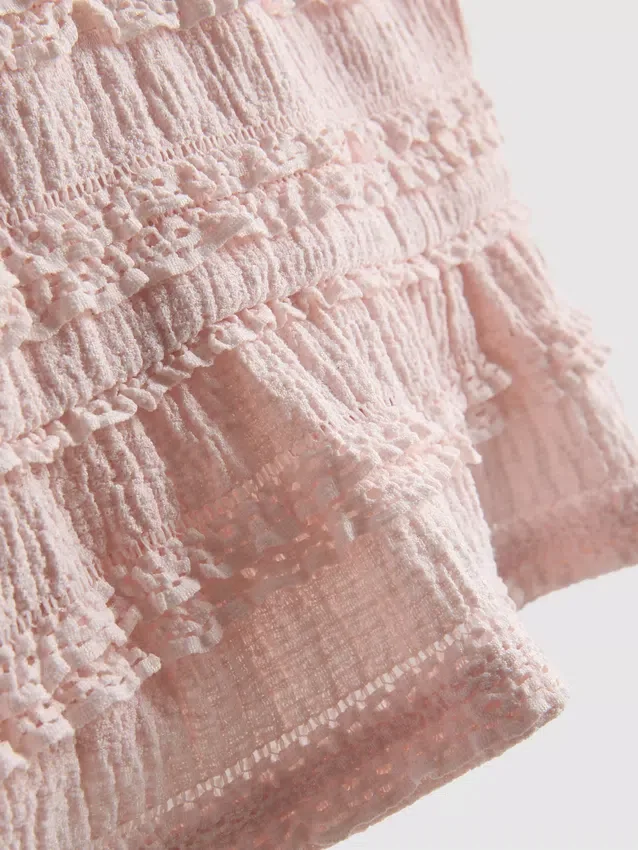 1,5–9 år | peplum-blus utan ärmar