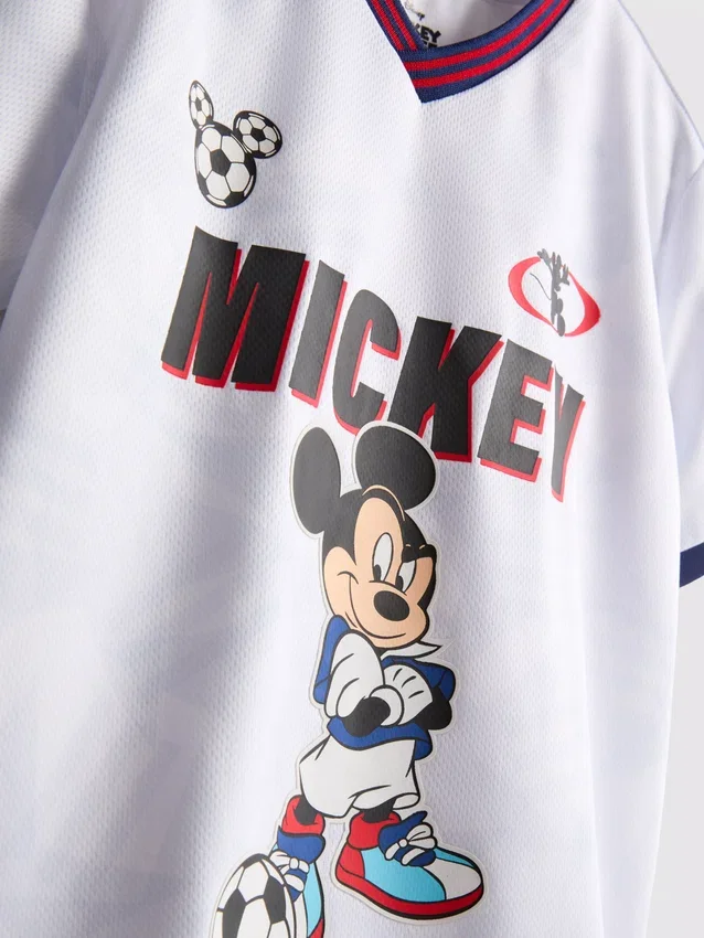1,5–9 år | Set med T-shirt och Shorts med Disneys Minnie Mouse-fotbollsmotiv