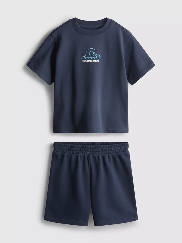 1,5–9 år | Set med T-shirt och shorts med tropiskt tryck