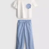 1,5–9 år | Set med volang-T-shirt och byxor