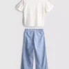 1,5–9 år | Set med volang-T-shirt och byxor