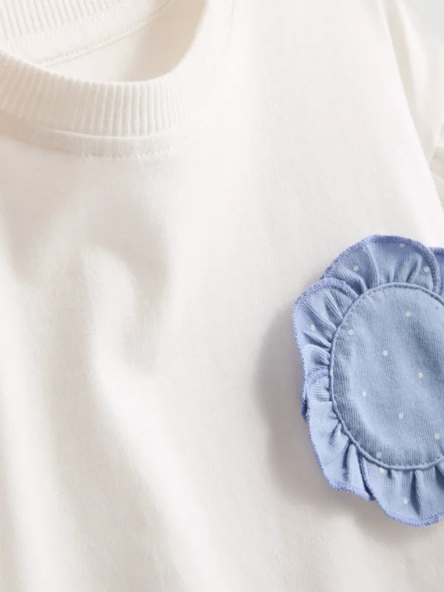 1,5–9 år | Set med volang-T-shirt och byxor