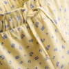 1,5–9 år | Set med volang-T-shirt och byxor