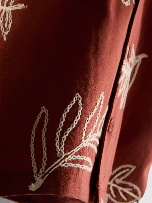 1,5–9 år | skjorta med broderat lövmotiv