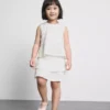 1,5–9 år | Skort med spetskant och flerskiktad design
