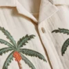 1,5–9 år | T-shirt med broderat palmträd