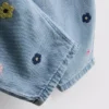 1–9 år | broderade mom-Jeans