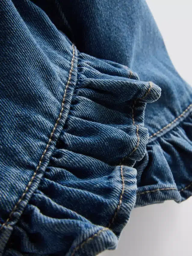 1–9 år | Jeans med volang i nederkanten