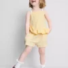 1–9 år | Set med peplum-top och shorts