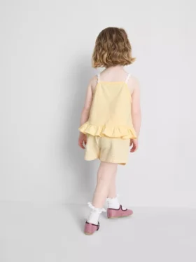 1–9 år | Set med peplum-top och shorts