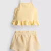 1–9 år | Set med peplum-top och shorts