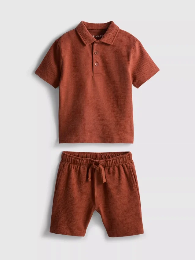 1–9 år | Set med strukturerad polotröja och shorts