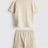 1–9 år | Set med strukturerad polotröja och shorts