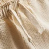 1–9 år | Set med strukturerad polotröja och shorts