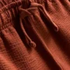 1–9 år | Set med strukturerad polotröja och shorts