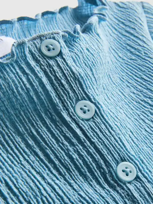 7–15 år | blus med skrynklig struktur