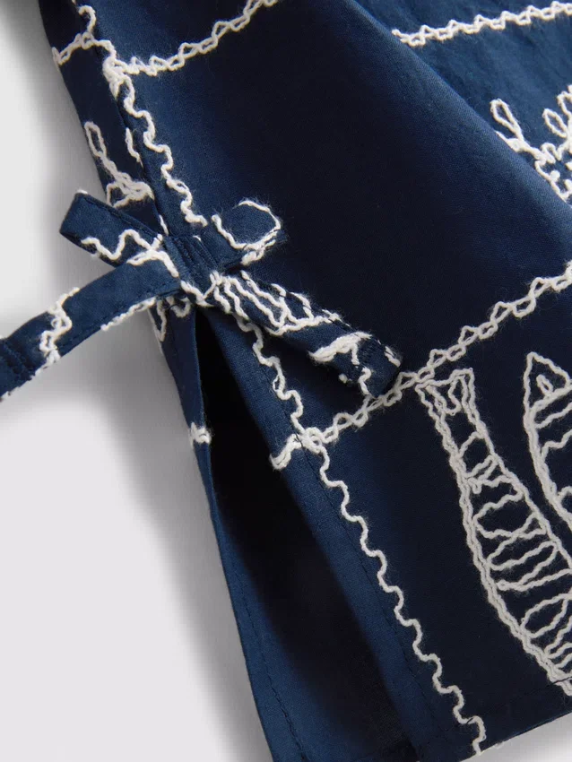 7–15 år | broderad ärmlös blus