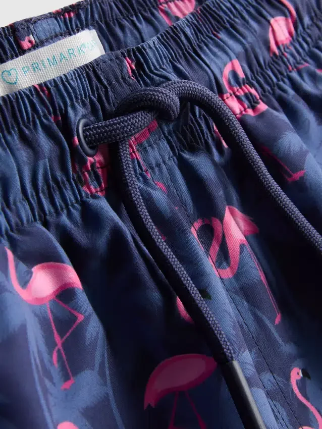 7–15 år | flamingo-motiverade badshorts