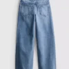 7–15 år | Jeans med breda ben och broderad blommig rosett