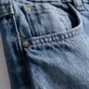 7–15 år | Jeans med breda ben och broderad blommig rosett