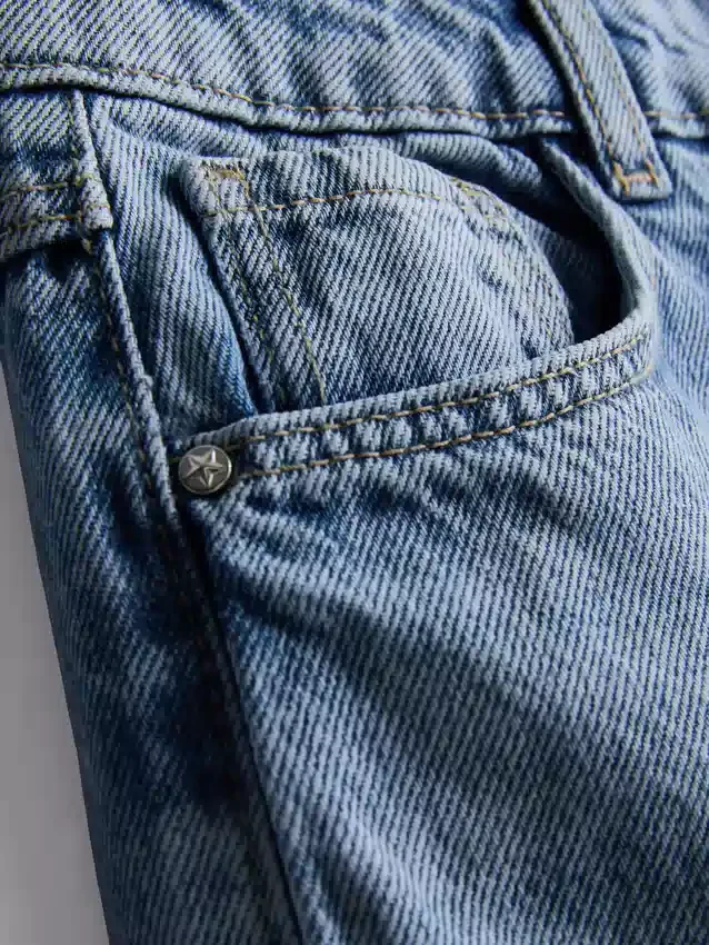 7–15 år | Jeans med breda ben och broderad blommig rosett