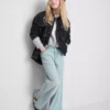 7–15 år | Jeans med slits i benslutet och vida ben