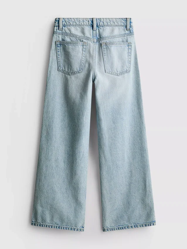 7–15 år | Jeans med slits i benslutet och vida ben