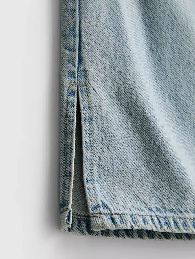 7–15 år | Jeans med slits i benslutet och vida ben